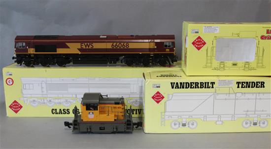 An Aristocraft G gauge Class 66 EWS diesel locomotive ART 23213, a Lil Critter Union Pacific diesel locomotive and a Vanderbilt Union